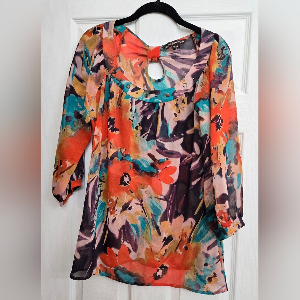 Sheer multi colored blouse.  Size small